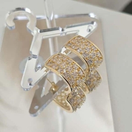 brinco meia argola cravejada