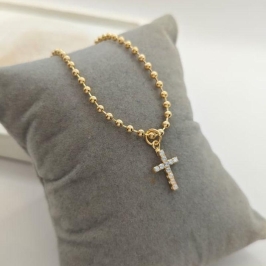 pulseira de bolinha e cruz