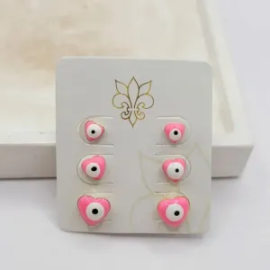 trio de brinco olho grego coração rosa