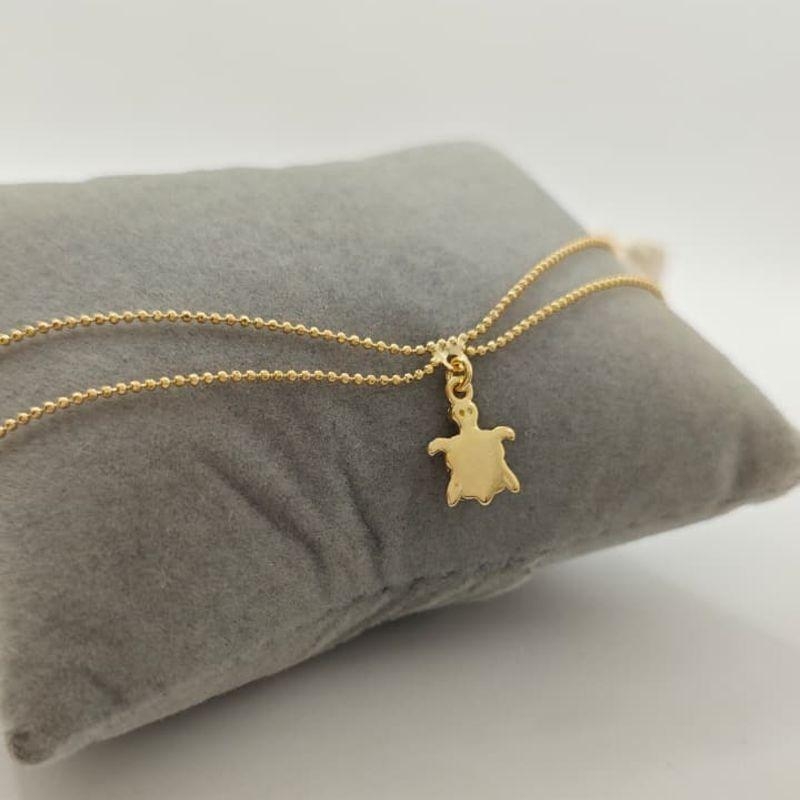 tornozeleira dupla com tartaruga