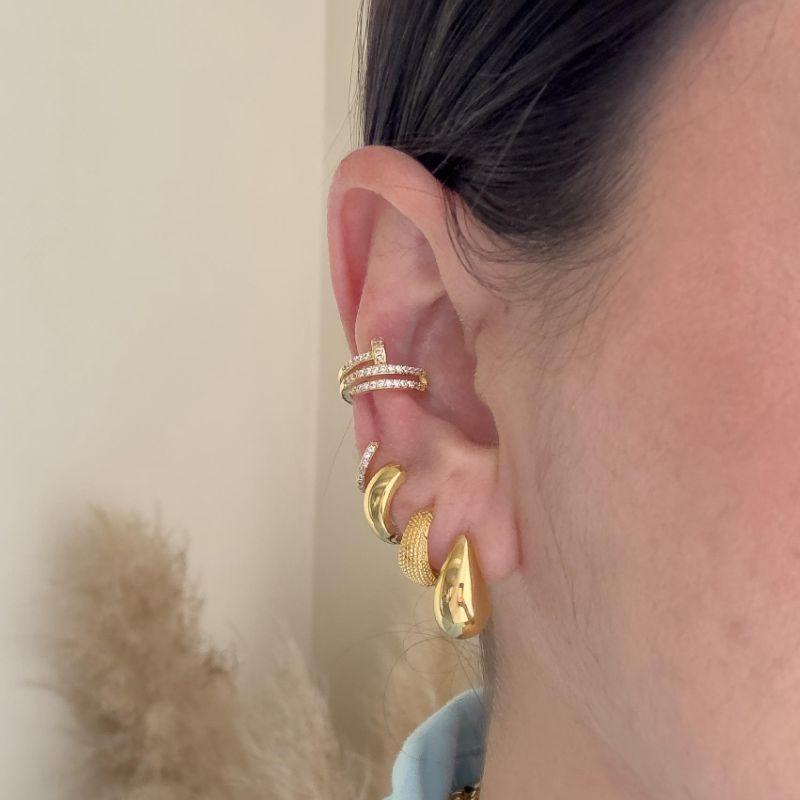 piercing fake prego cravejado