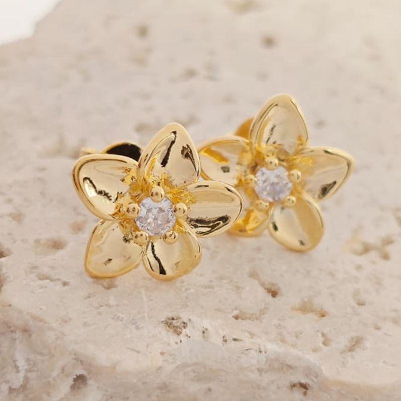brinco flor com ponto de luz