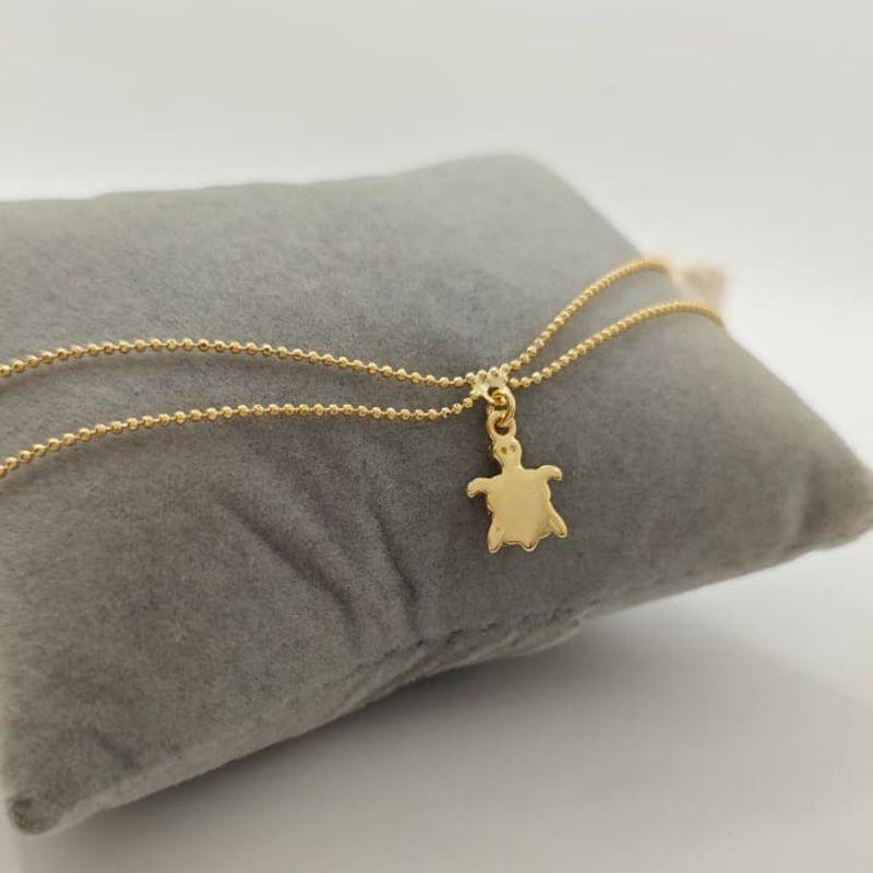 tornozeleira dupla com tartaruga